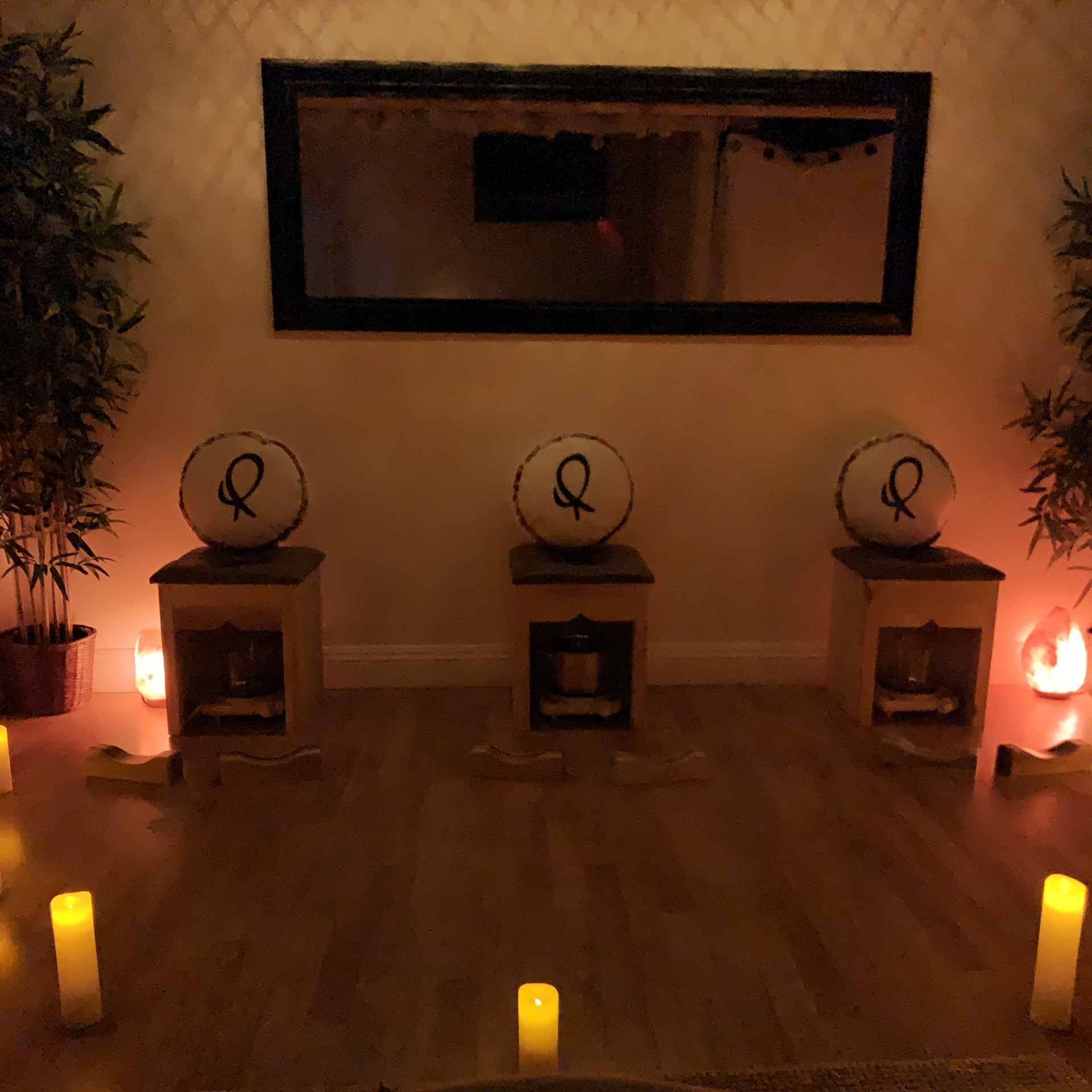 Guests seated together in the Rest House in soft, loose clothing