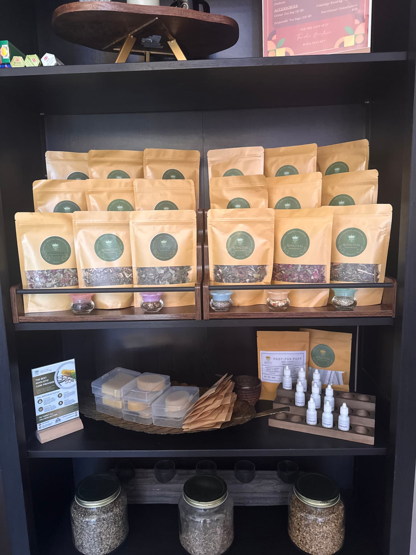 Curated RoyalTEAS wellness products displayed in the Queen By Nature Community Marketplace.
